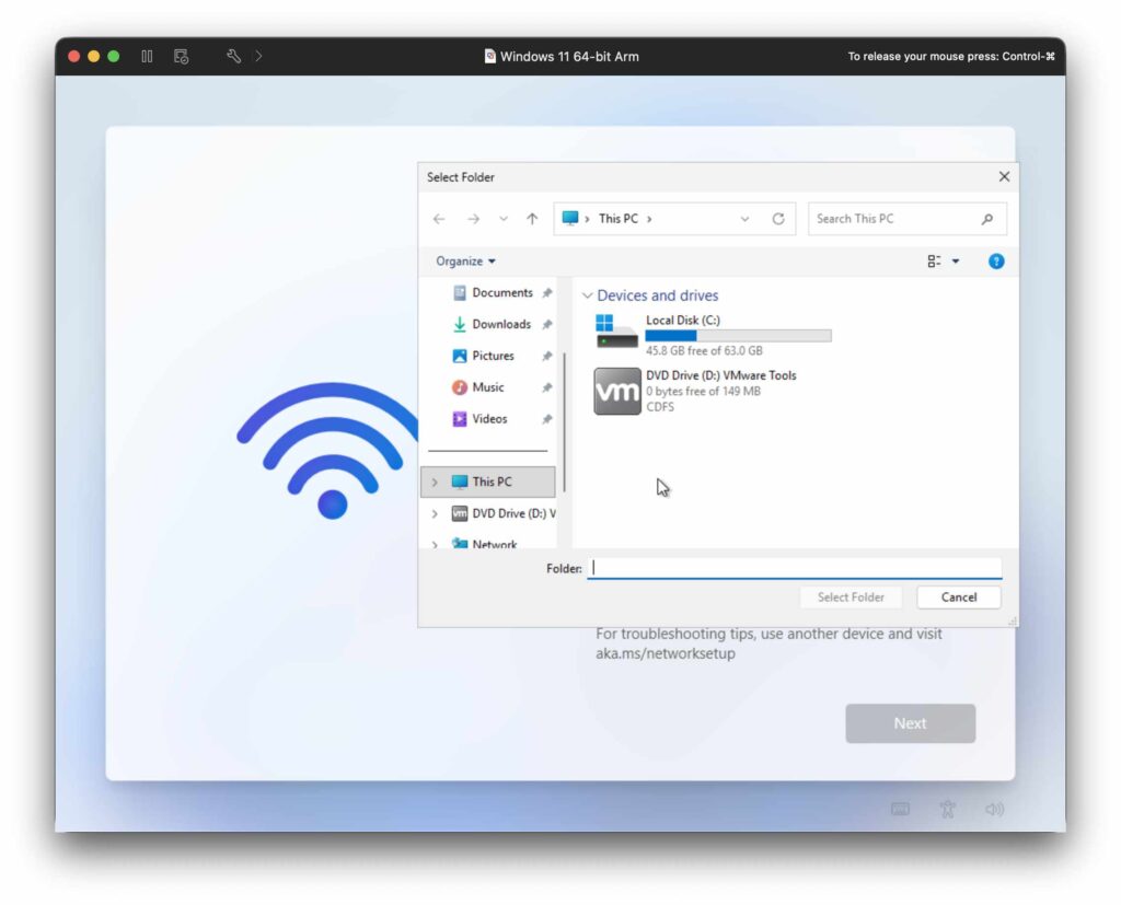 Fix “Let’s connect you to a network” screen in Windows 11 on Mac by selecting the VMware Tools virtual DVD